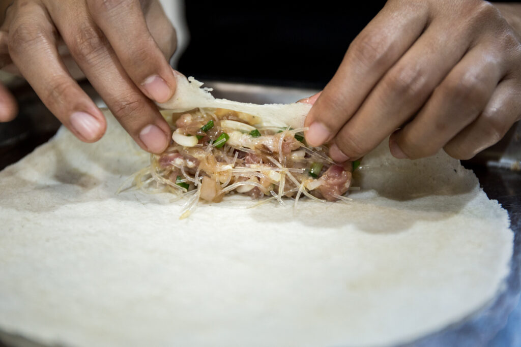 Midsection man preparing food