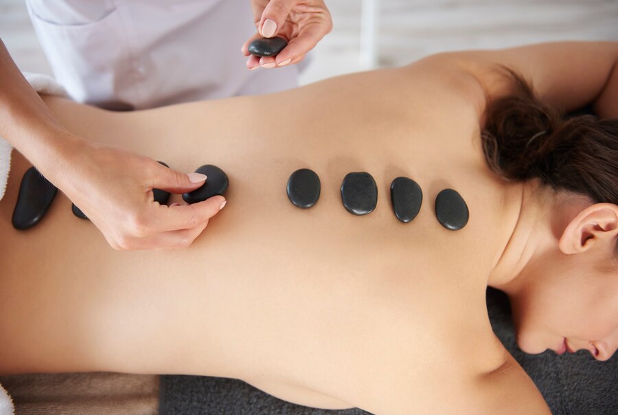 Woman getting massage back by hot stones 329181 18804