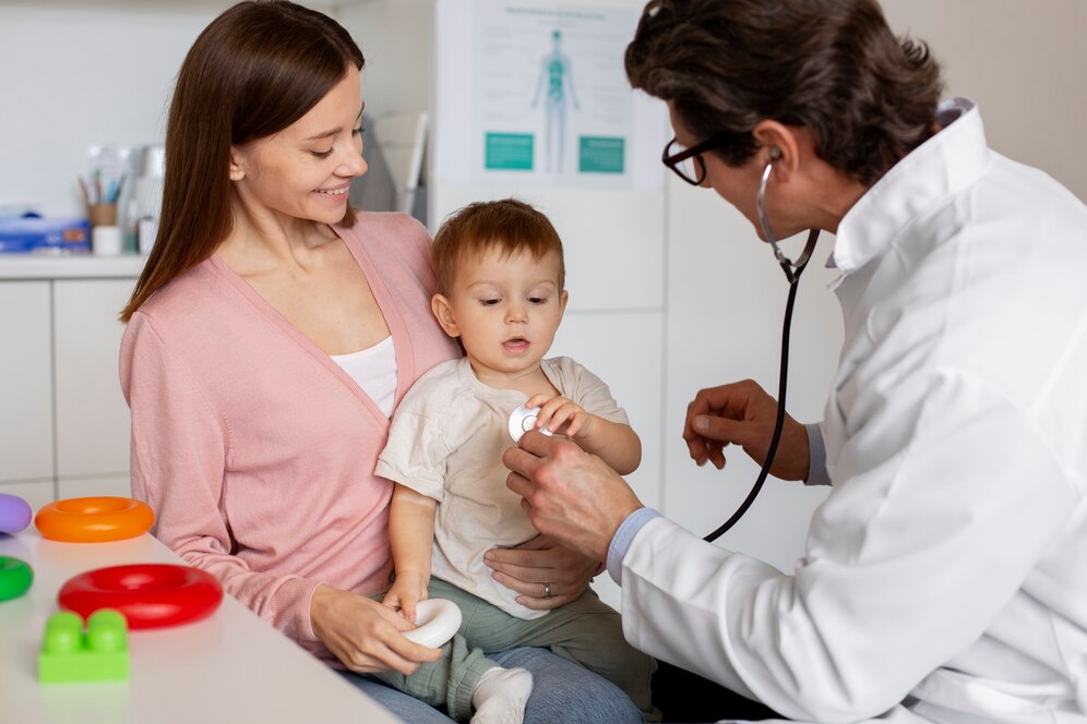 Young mother with toddle pediatrician consultation 23 2149187446