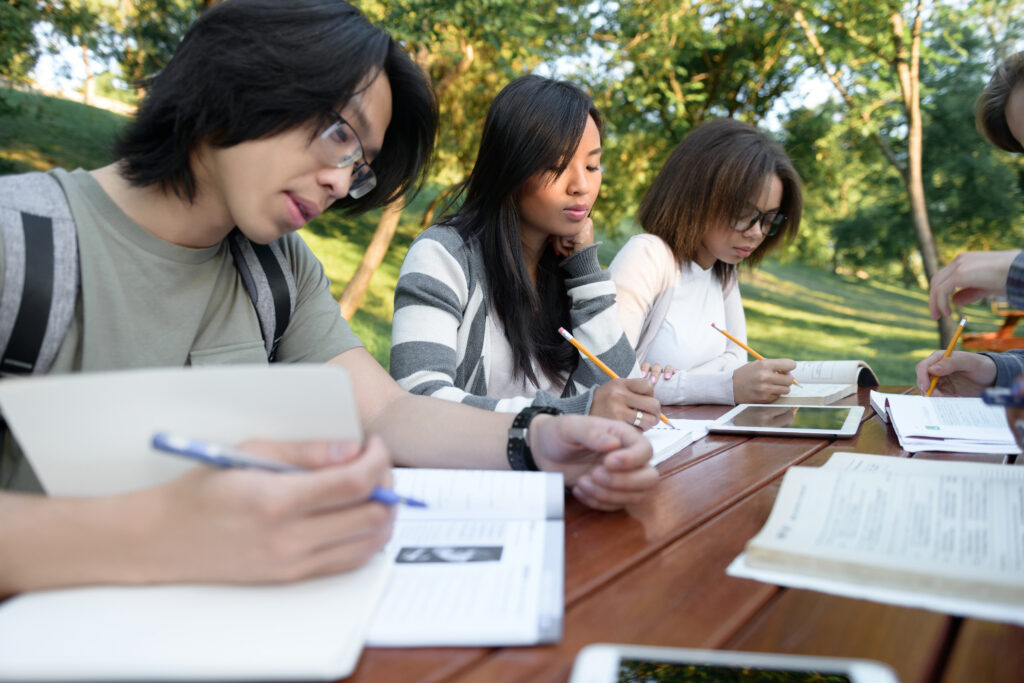 Multiethnic group of concentrated young people
