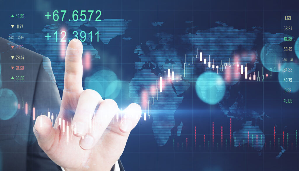 Close up of businessman hand pointing at creative glowing forex graph hologram on blurry bokeh background. market analysis and trade concept. double exposure.