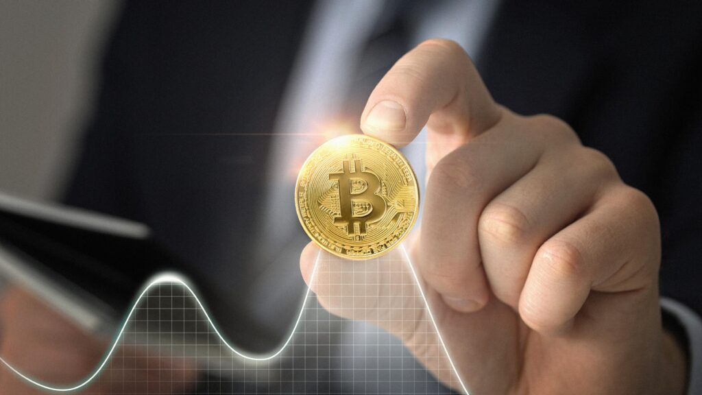 Close up hand holding coin