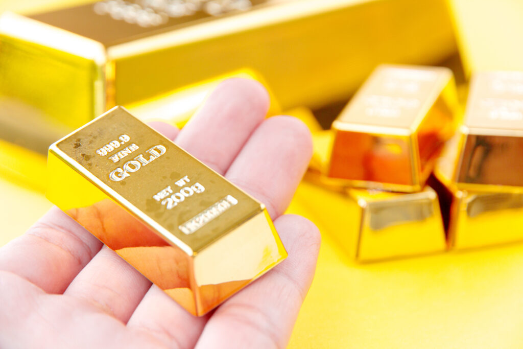 Close up hand holding ingot