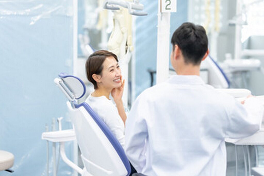 Man woman smiling dentist