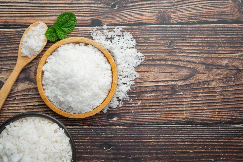 Salt in wooden small plate