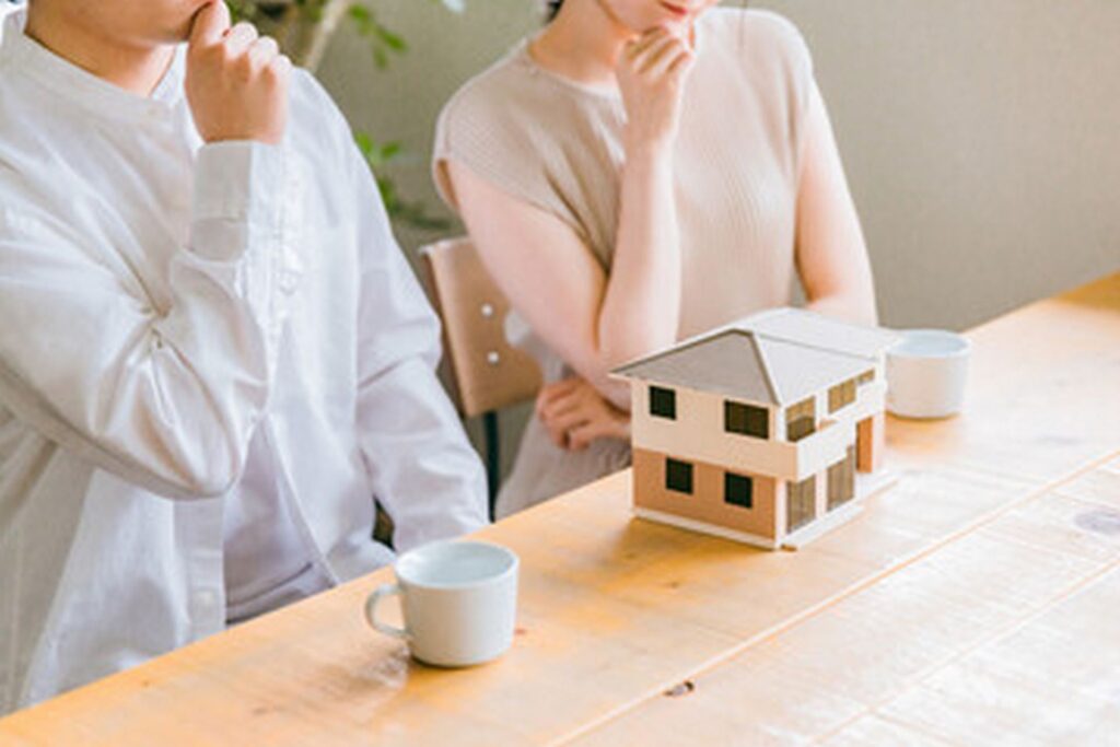 Sea with boats it surrounded by hills covered greenery sunlight