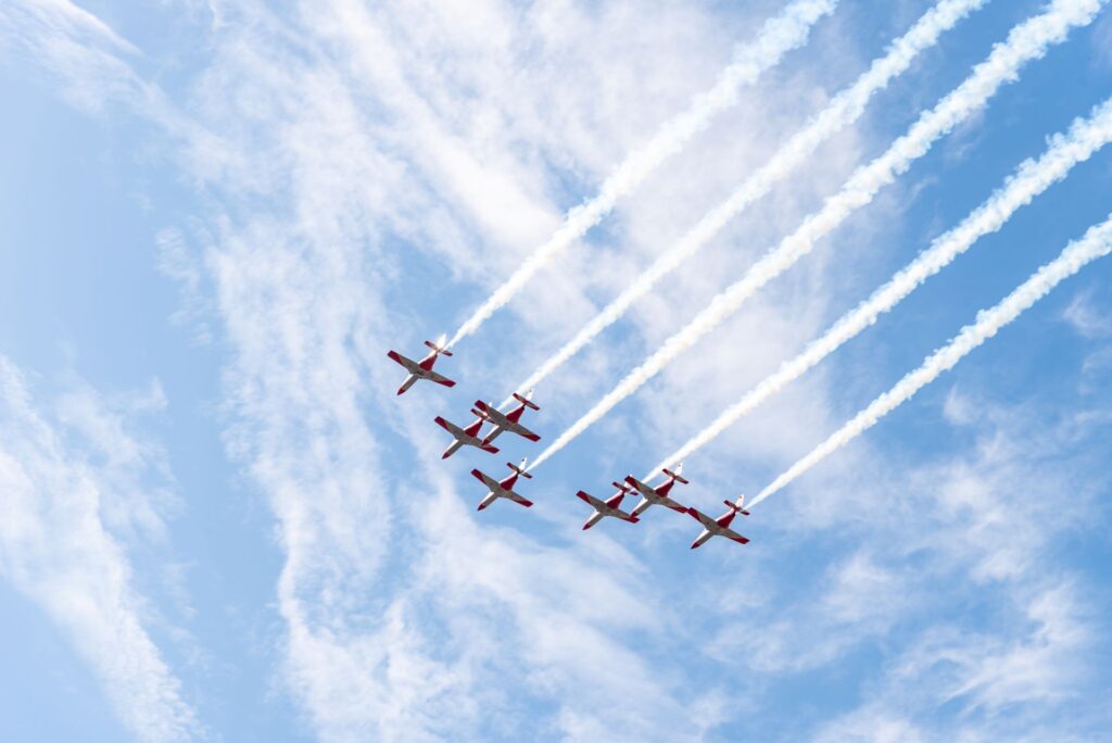 Seven fighting jets flying sky